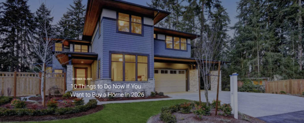 A modern two-story home with large windows and a wooden exterior is surrounded by tall trees. Text overlay reads, "10 Things to Do Now If You Want to Buy a Home in 2026."
